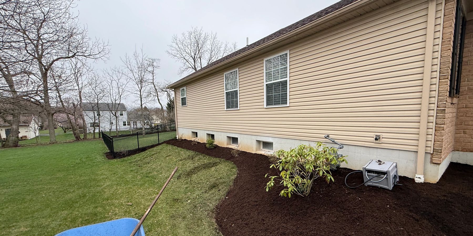 Striped lawn mowed by MB Landscaping